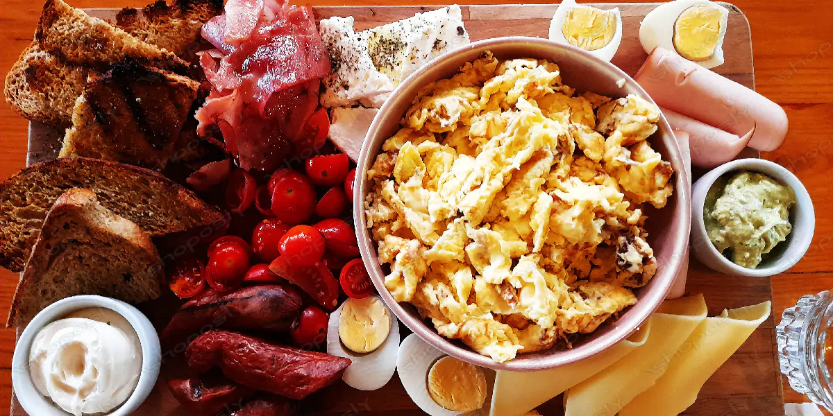 Gourmet Breakfast Feast in a Cozy, Nature-Inspired Café – Ultra-High-Resolution Culinary Photography